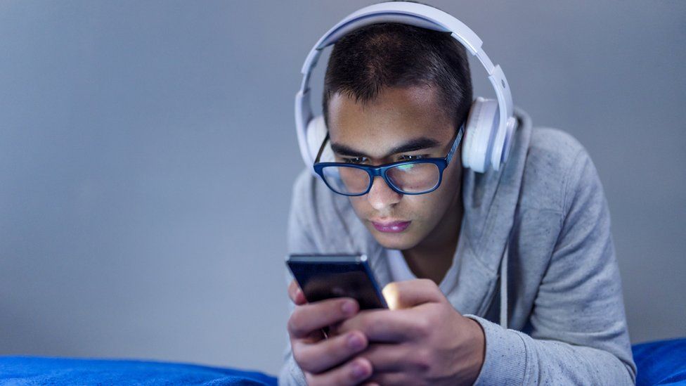 Young man with headphones on