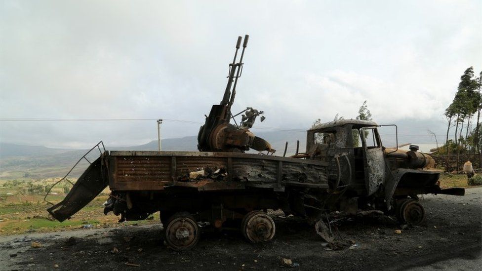A machine gun mounted in a burnt-out truck on the road to Abiy Addi town in Ethiopia, July 10, 2021. The area saw fierce fighting between Ethiopia"s military and Tigrayan forces