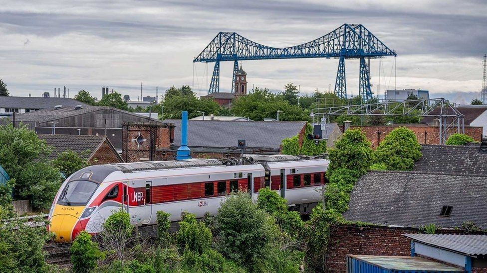 Azuma train in front of Middlesbrough townscape