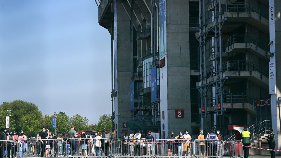 People queued up outside London's Twickenham rugby stadium for a Covid vaccine