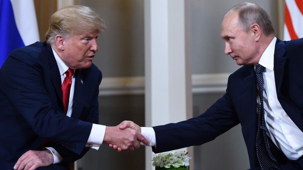Trump calls Putin and talks of 'Russian hoax' - BBC News