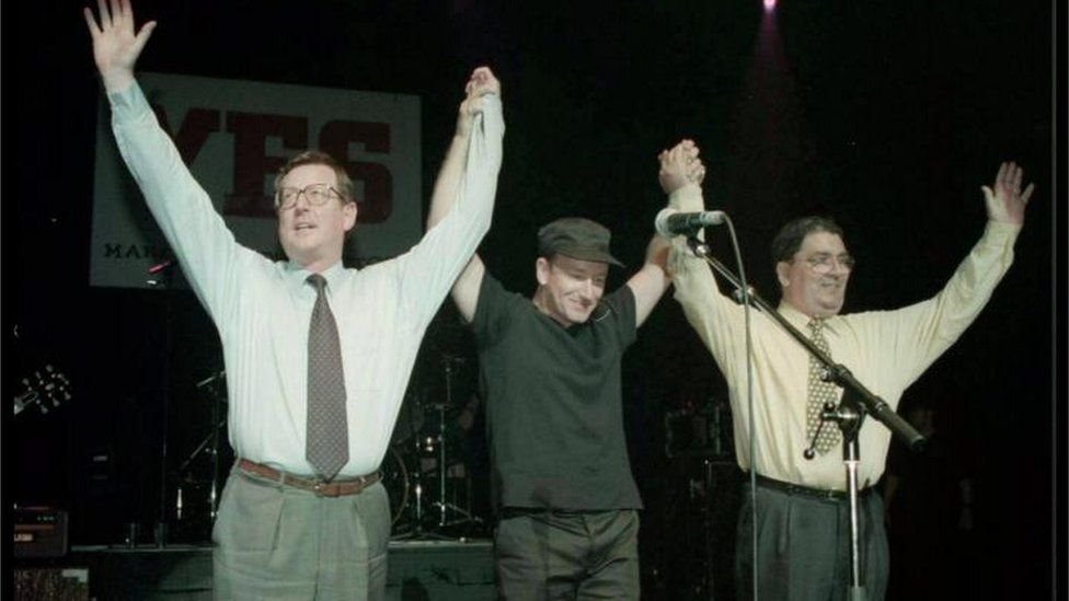 Ulster Unionist leader David Trimble (left), U2 singer Bono, and SDLP leader John Hume on stage for the YES concert at the Waterfront Hall in Belfast in 1998
