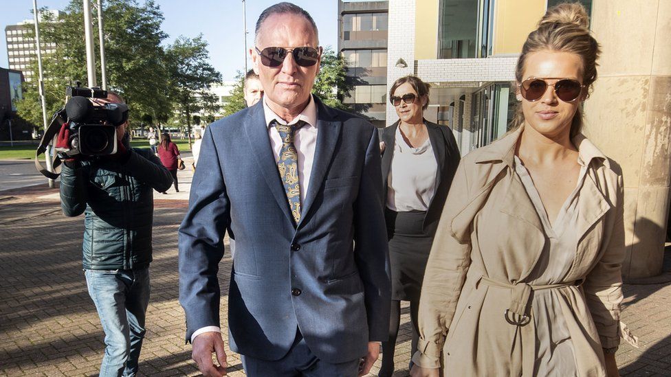 Paul Gascoigne arriving at Teesside Crown Court with personal manager Katie Davies