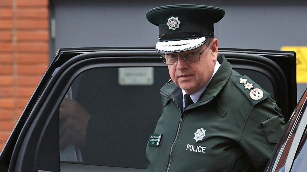 Chief Constable Simon Byrne gets out of a car at the Policing Board headquarters in Belfast