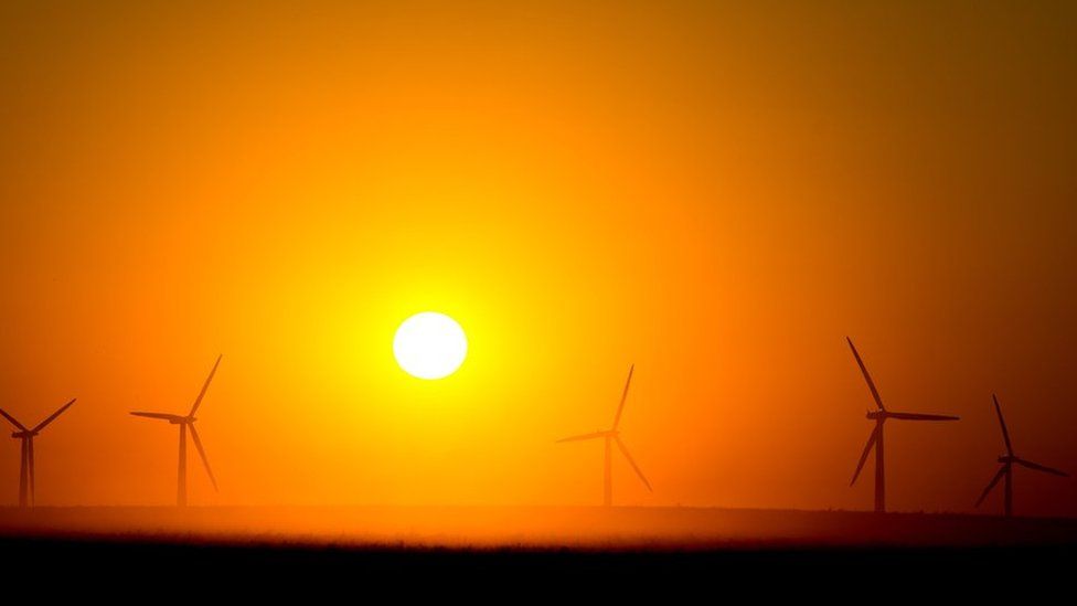 German wind farm with sunrise