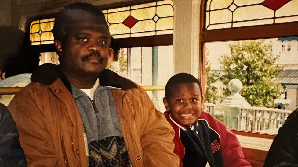 Abubakar Salim with his father during his childhood