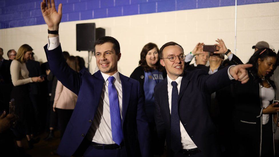 Buttigieg (left) pictured with his husband during his failed presidential campaign