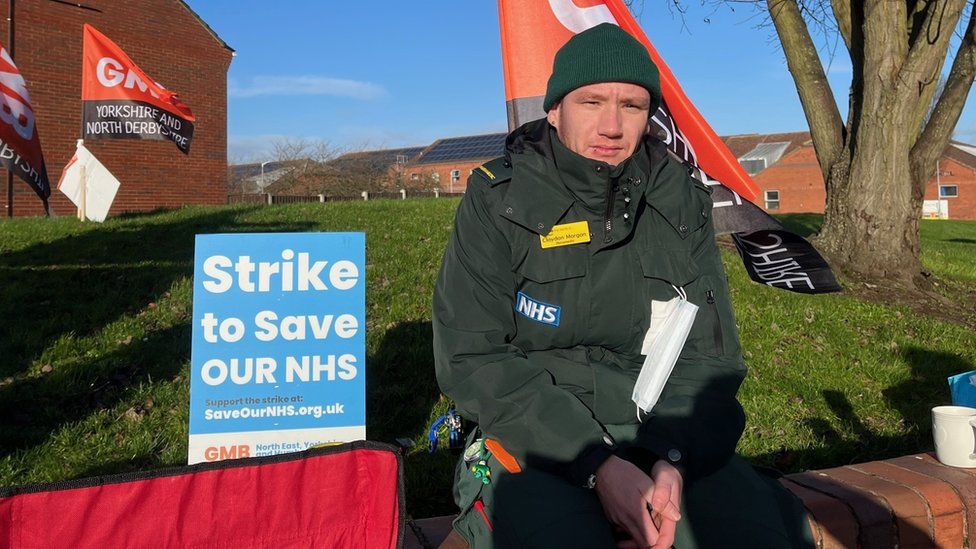 Paramedic Claydon Morgan says he has spent entire shifts queuing outside A&E departments