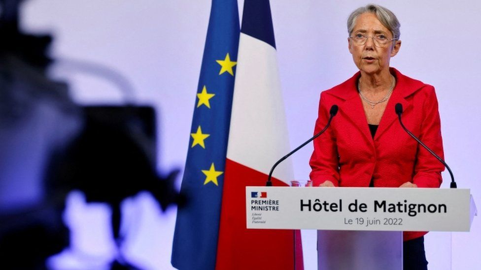 France's Prime Minister Elisabeth Borne gives a speech after the first results on Sunday