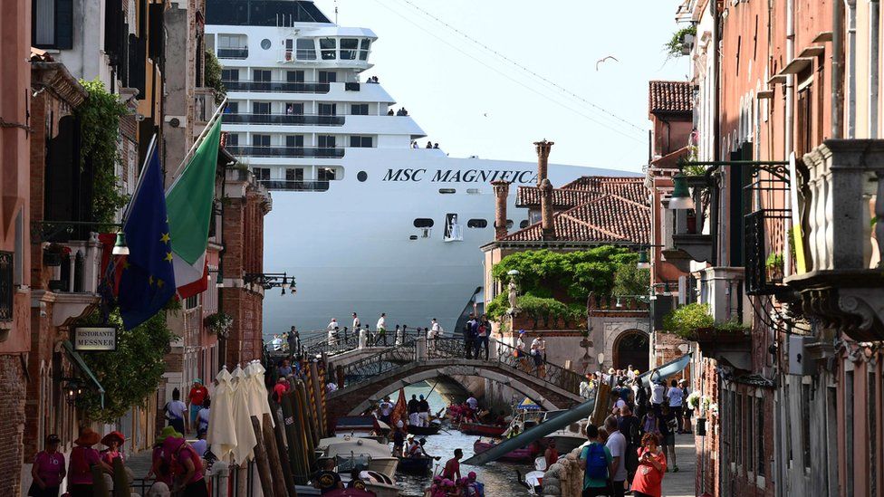 The MSC Magnifica is seen from one of the canals leading into the Venice Lagoon