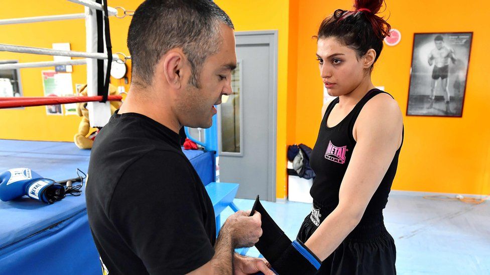 Iranian boxer Sadaf Khadem (R) with her trainer, Mahyar Monshipour (L)