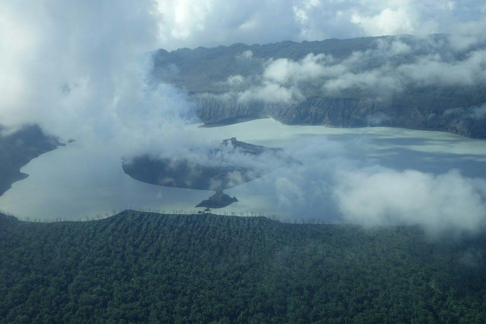 A cloud of smoke from Monaro volcano is seen on Vanuatu's northern island Ambae in the South Pacific, 25 September 2017 in this aerial picture.