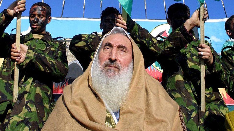 Sheikh Ahmed Yassin, the spiritual leader of Hamas, attends a rally to mark the 15th anniversary of the group's foundation in Gaza City (27 December 2002)