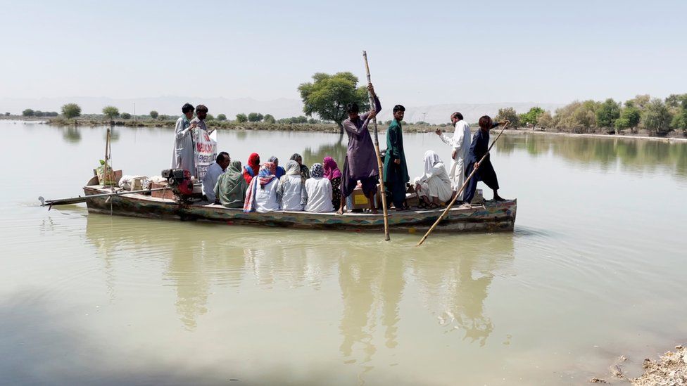 Medics must take to boats like these to get to people stranded in the floods