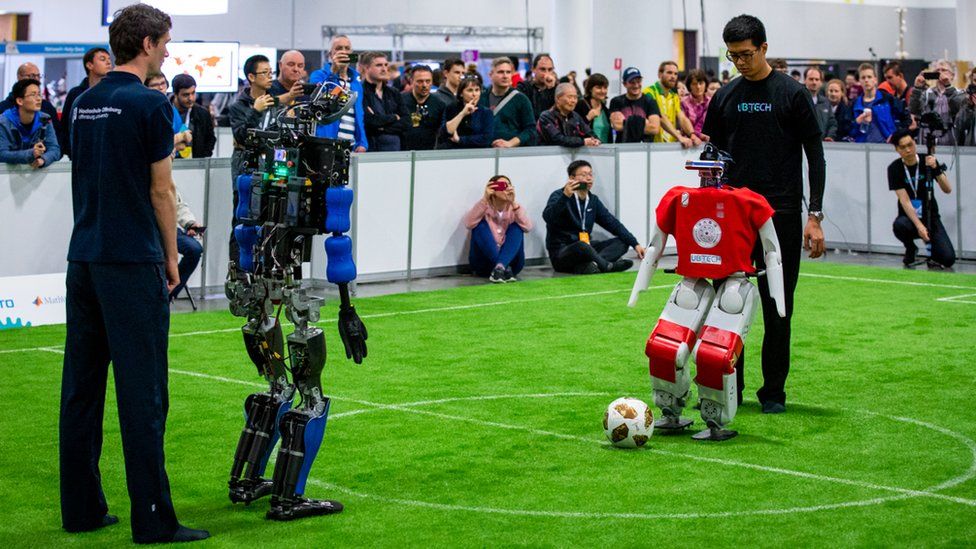 Football store playing robot