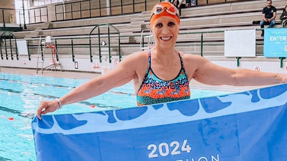 Swimathon: Woman living with incurable cancer swims for charity - BBC News