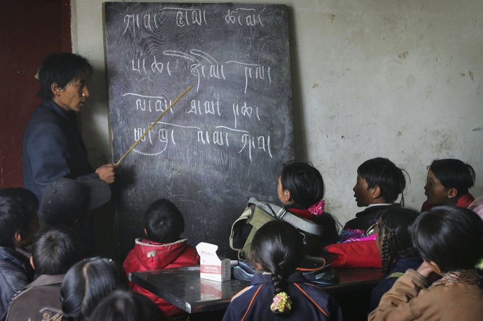 Tibetan students attend a Tibetan language class at the Wanquan Primary School at the Yanshiping Township on July 7, 2006 in Yanshiping Township, Amdo County of Tibetan Autonomous Region, China.