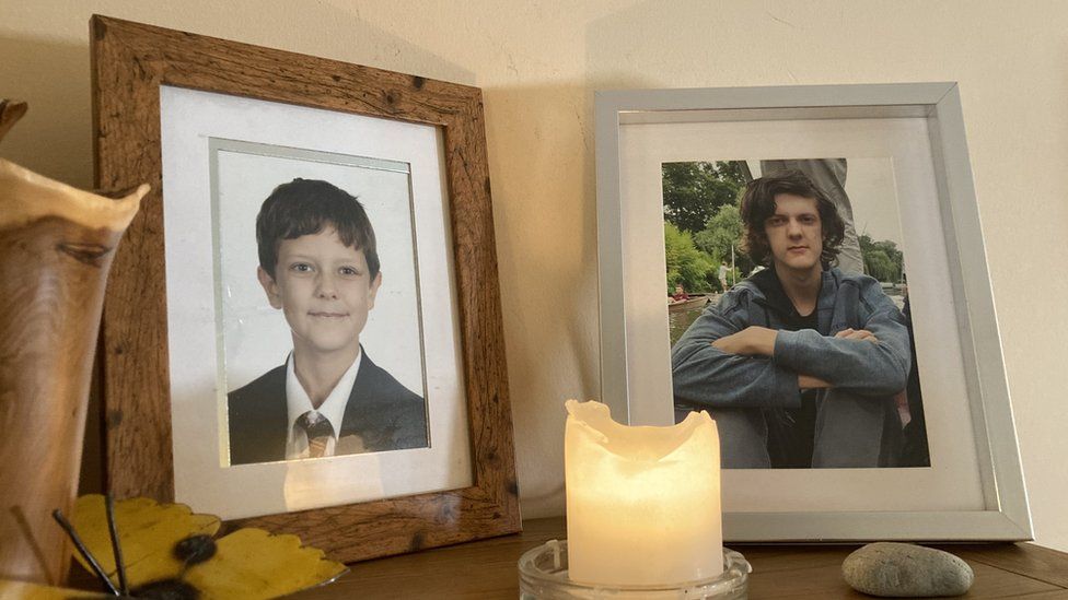 Photos and a candle lit for Leo