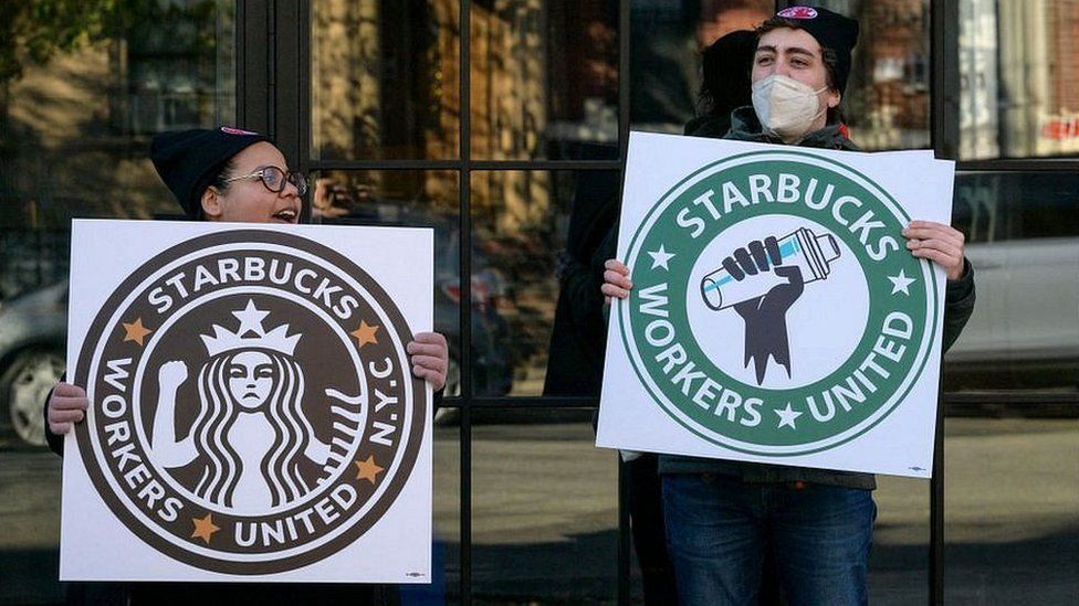 Starbucks workers strike outside a Starbucks coffee shop in the Brooklyn borough of New York City.