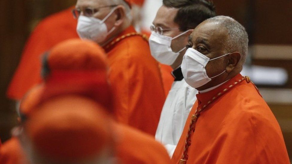 Wilton Gregory wearing a face mask as he is appointed a cardinal