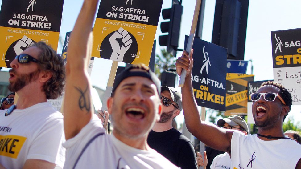 Sag-Aftra members and supporters chant outside Paramount Studios on day 118 of their strike against the Hollywood studios on November 8, 2023 in Los Angeles, California