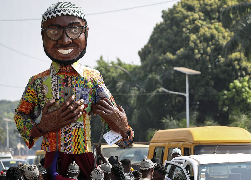 A giant puppet of Amílcar Cabral seen on the streets of Bissau, Guinea-Bissau - Thursday 21 November 2019
