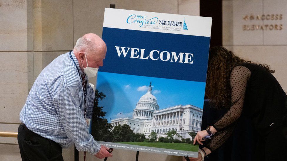 Staffers out up signs up for new member orientation on Capitol Hill