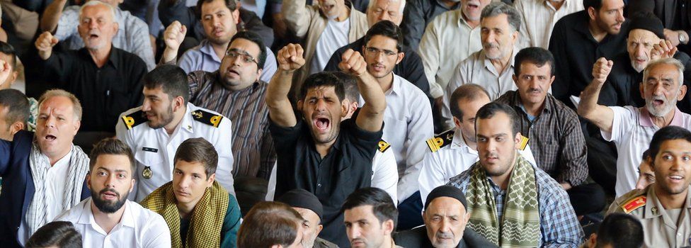 Iranian worshippers shout anti-US slogans during the weekly Friday prayer in Tehran on 13 October 2017