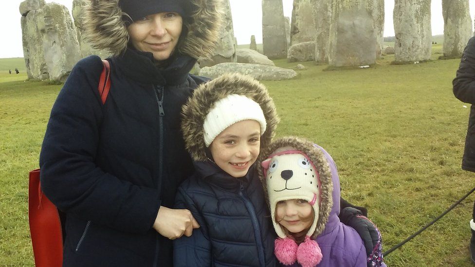 Sandrine Charpentier and her two daughters