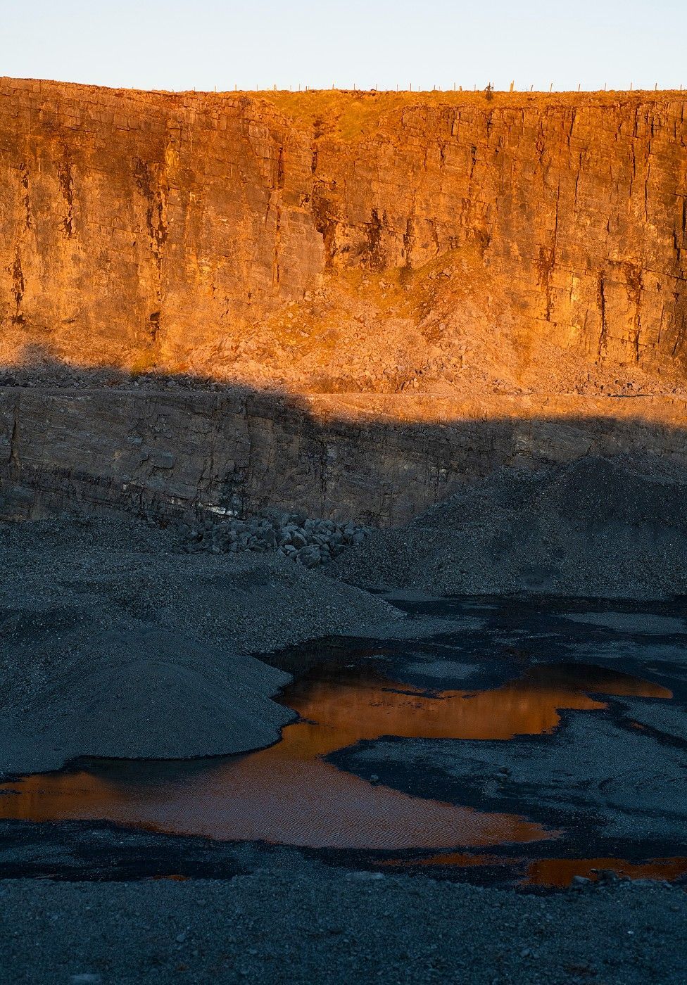 Adisused quarry half in shadow, half in sunlight