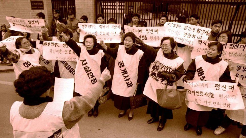 A picture of former "comfort women" and their supporters holding a rally outside the Japanese embassy in 1992