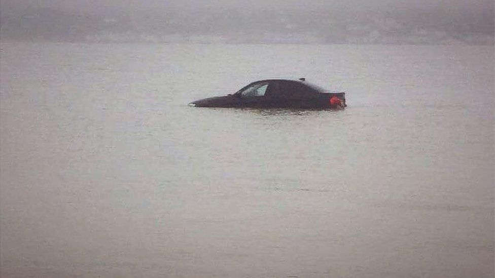 A car submerged in the sea