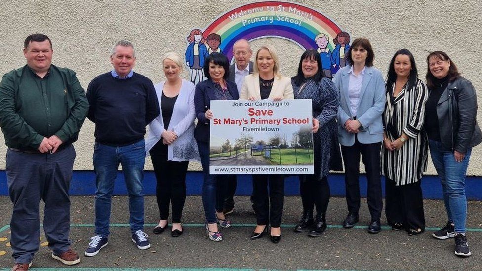 Sinn Fein’s deputy leader Michelle O’Neill with governors and community representatives at the school