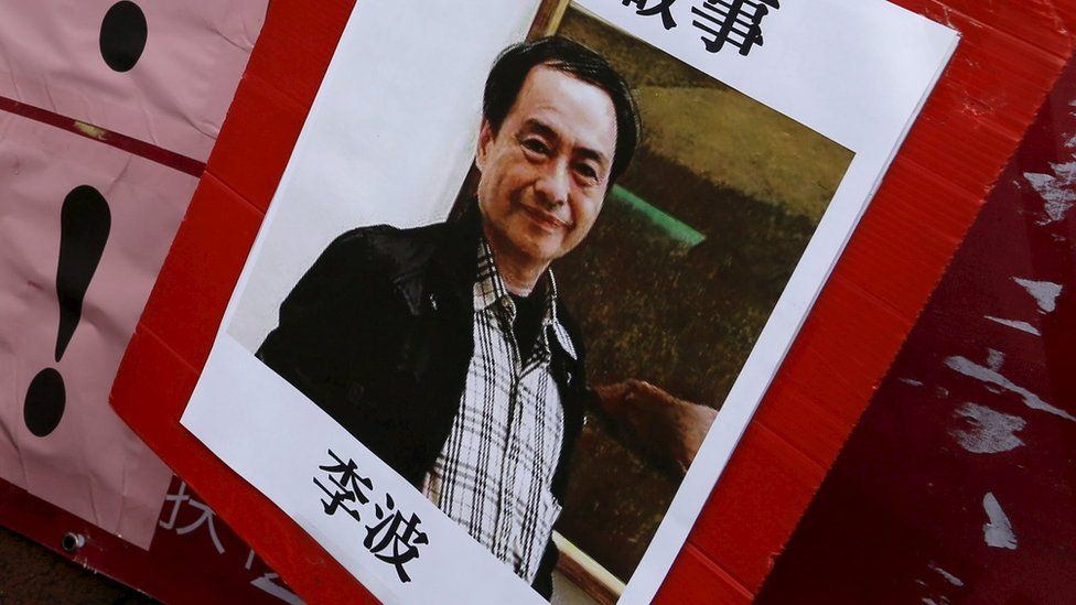 Demonstrators showing a picture of Causeway Bay Books shareholder Lee Bo in Hong Kong, China 3 January 2016.