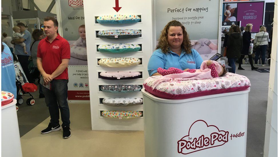 Charlotte Marshall and her team selling the poddle pod at the baby show
