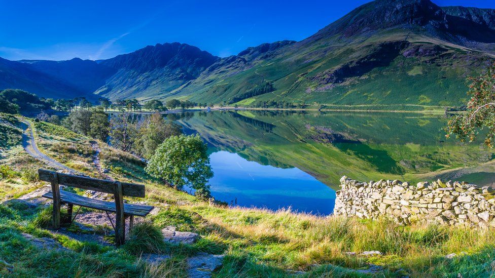 Wooden bench overlooking Buttermere in the Lake District