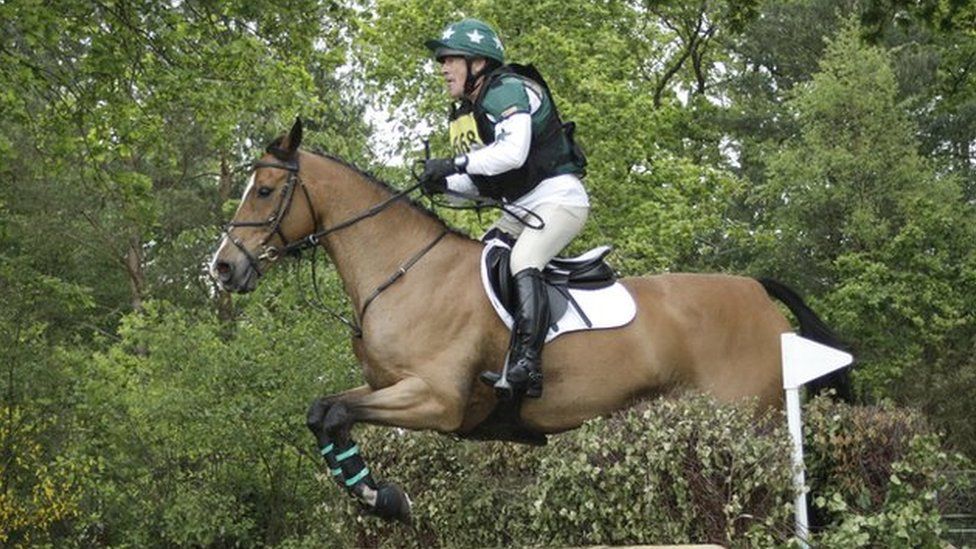 Neil Woodford riding his horse in competition