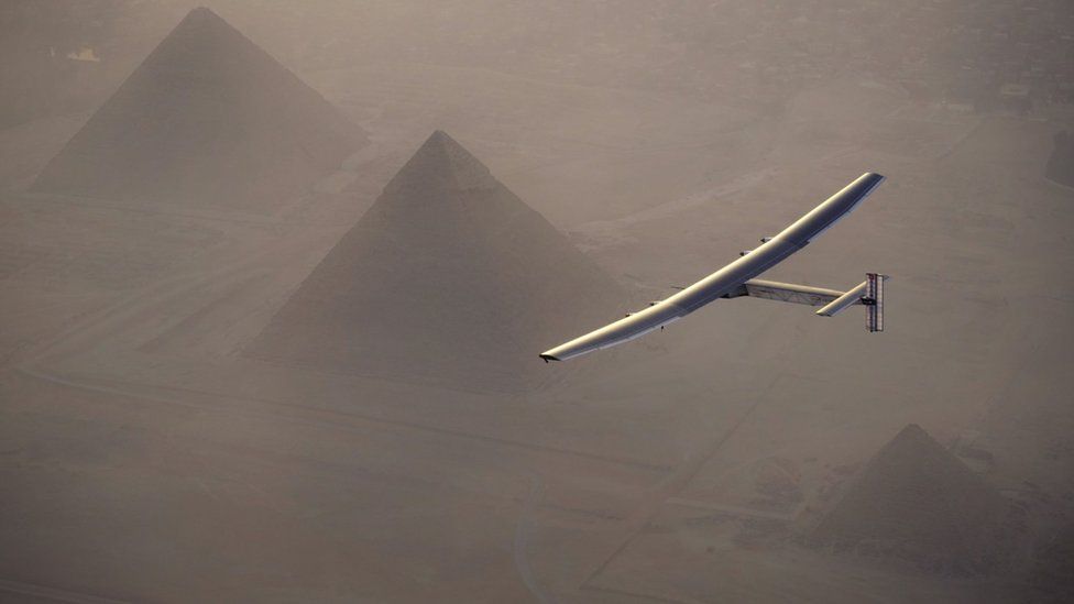 The Solar Impulse flying over the pyramids in Egypt