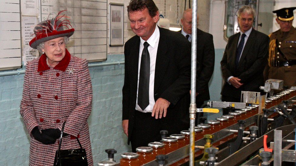 Queen Elizabeth II inside the jam factory
