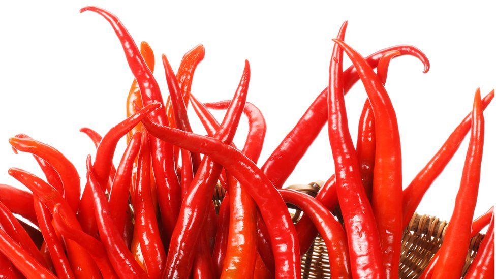 Chillies arranged like flames in a fire