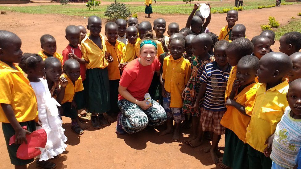 Bethany Barr with school children in Uganda