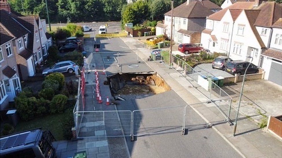 The Bexleyheath sinkhole with police looking on and cordons in place