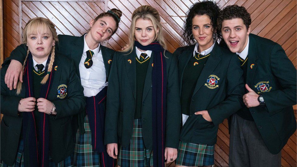 Clare Devlin (Nicola Coughlan), Orla Mccool (Louis Clare Harland) Erin Quinn (Saoirse Monica Jackson), Michelle Mallon (Jamie-Lee O'Donnell) and James Maguire (Dylan Llewellyn) in Derry Girls