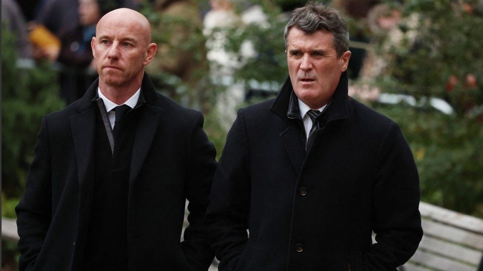 Former Manchester United players Nicky Butt and Roy Keane arrive at Manchester Cathedral