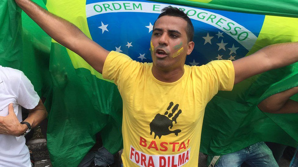 An anti-government protester outside the presidential palace in Brasilia