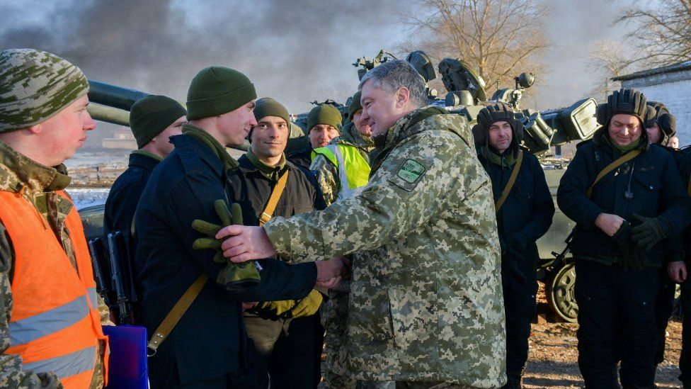 President Petro Poroshenko talking with tank crews during drills near the city of Chernihiv, northern Ukraine. 28 Nov 2018