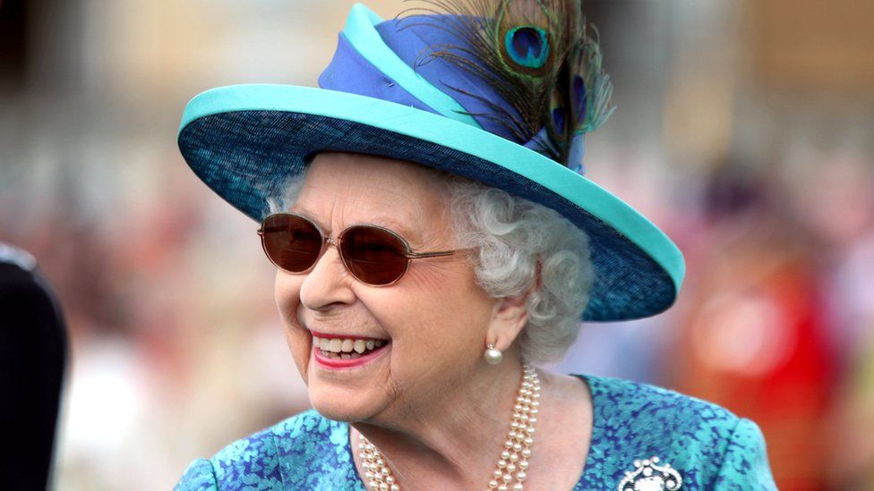 Queen wearing sunglasses