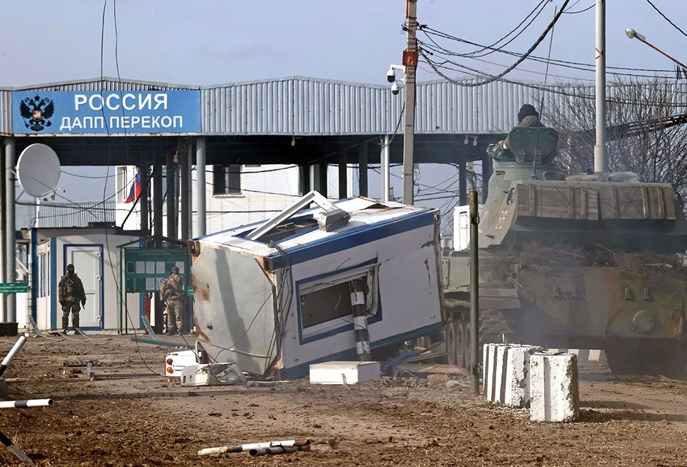 A security booth knocked over at the Perekop checkpoint, connecting the Crimean peninsula to the Ukrainian mainland