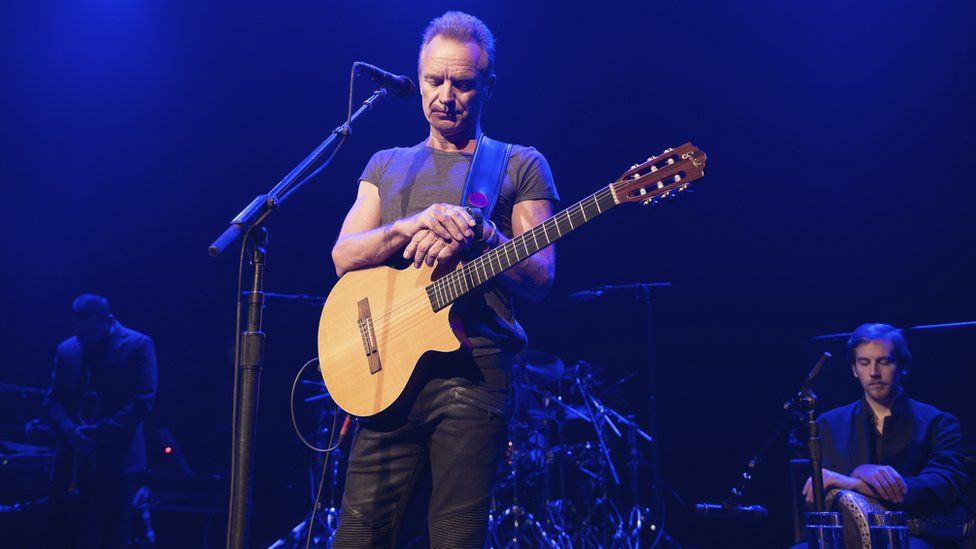 British artist Sting observes a minute of silence in memory of the victims of the November 13 2015 Paris attacks