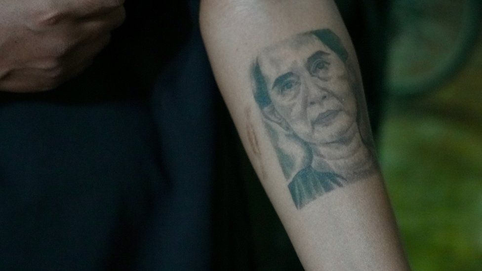 A young Burmese with tattoo of Aung San Suu Kyi